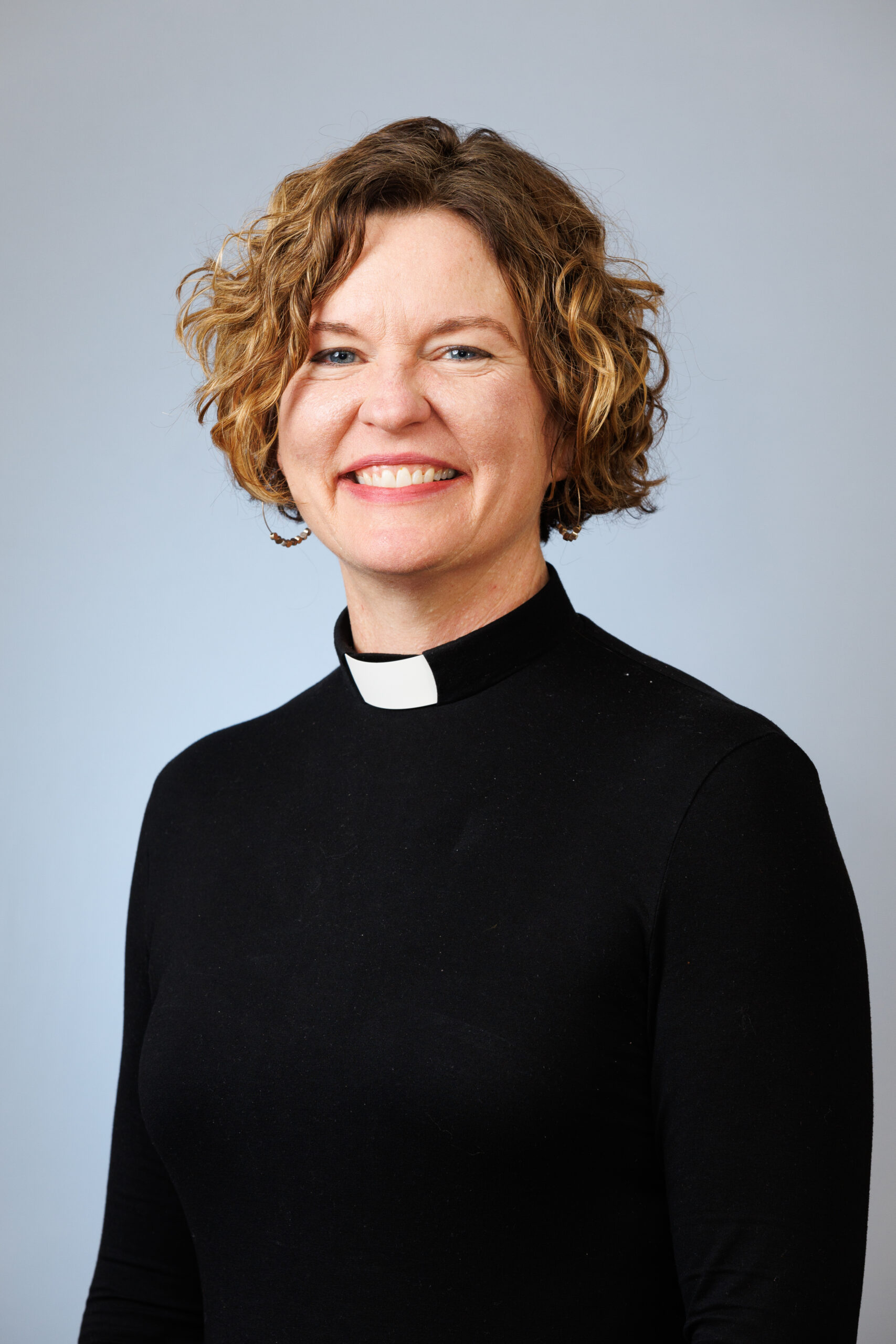 The Reverend Laurie Anzilotti (she/her)